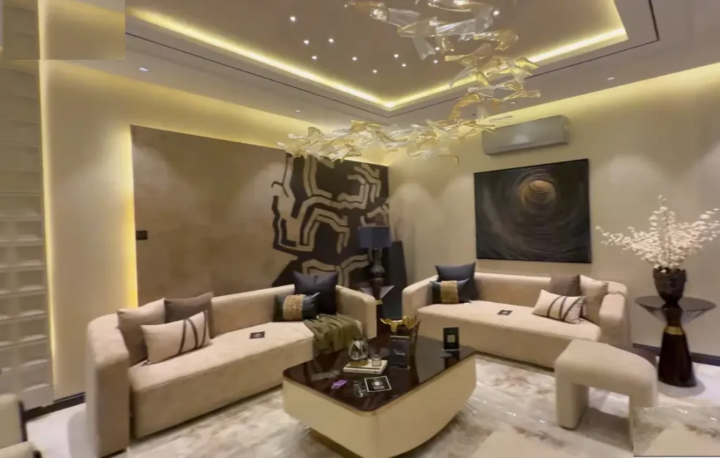 Luxury modern living room décor with beige sofa and warm lighting